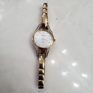 Seiko watch, gold plated rhinestone embellished.